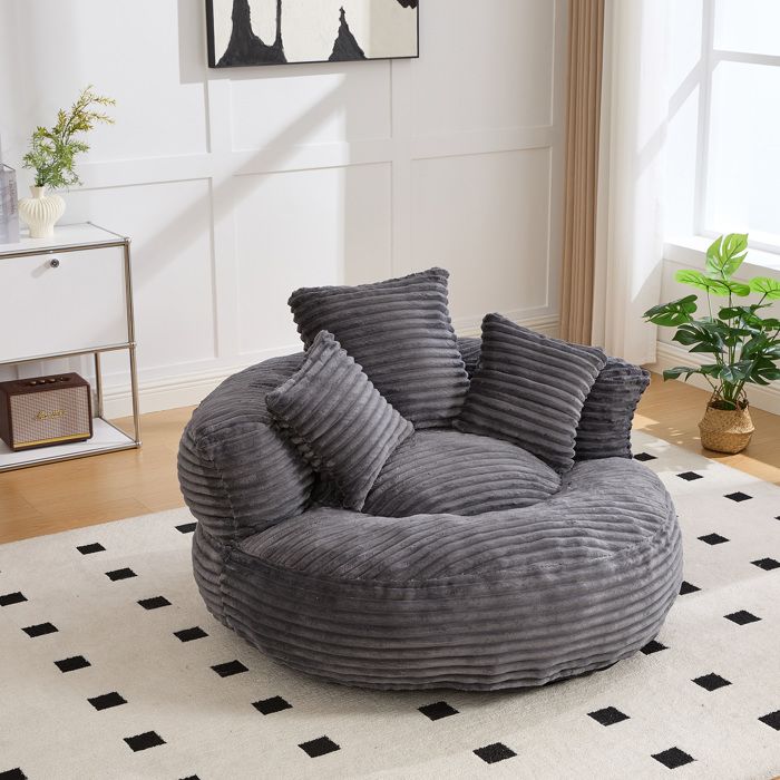 Chaise poire en tissu côtelé gris foncé dossier haut équipée de trois coussins pour toute la famille