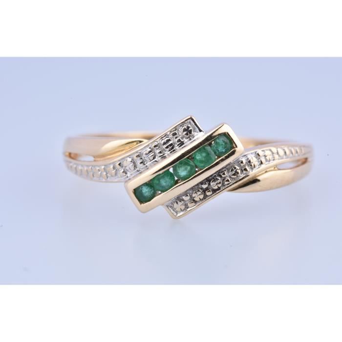 MONTE CARLO BIJOUX - Bague en or bicolore 18 carats (750 millièmes), composée de 5 émeraudes de 0.05 ct au total.