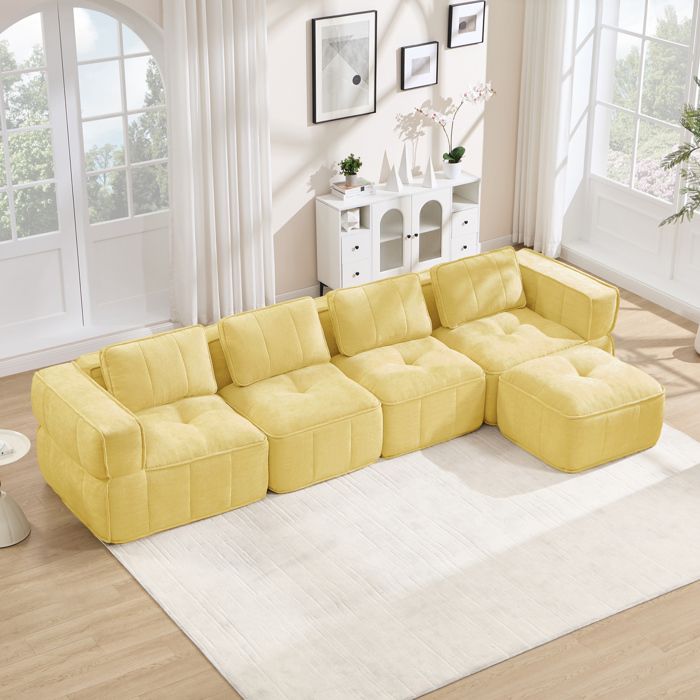 Canapé modulable d’angle 4 places en polyester jaune mousse 32D pouf inclus livré monté