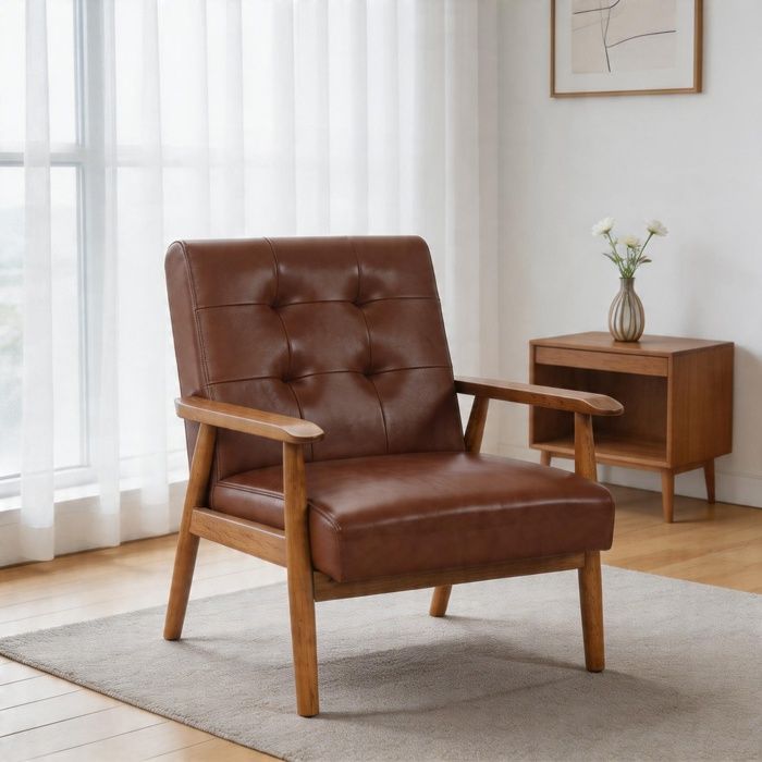 Fauteuil lounge - PAGE LIVING - Cuir et bois dhévéa - Accoudoirs noyer - Dossier coutures Pull-Point