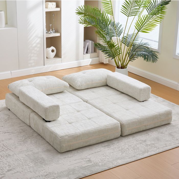 Canapé-lit pliable en chenille beige avec coussins tête et lombaires