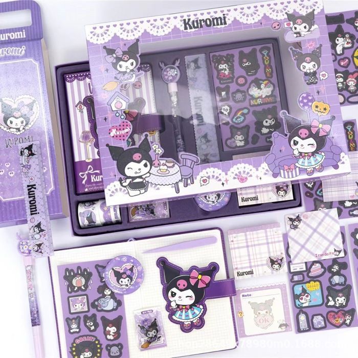 Une Collection De Fournitures Scolaires, Y Compris Un Carnet à Dos, Des