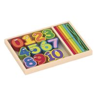 La boîte en bois contenant chiffres vivement colorés