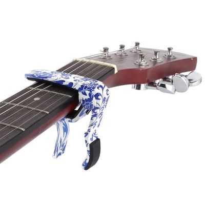 Fydun Capodastre de guitare Guitare acoustique Capo solide en bois de  silice Gel pince ergonomie avec 2 pics pour violon ukulélé - Cdiscount  Instruments de musique