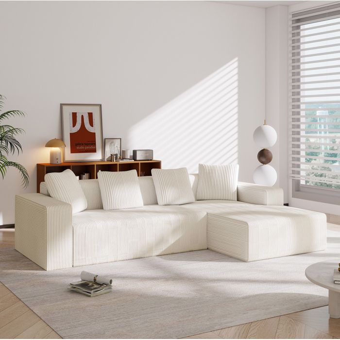 Canapé dangle 3 places en L modulable. avec 4 coussins. profondeur assise 70 cm. chaise 118 cm. velours côtelé blanc