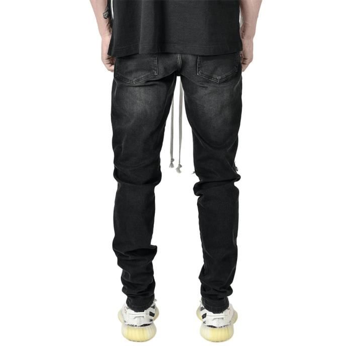 Jean déchiré noir homme sale