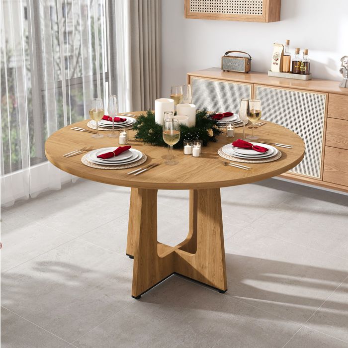 Table a manger ronde 120 cm en MDF aspect chene 4 a 6 places pieds reglables 76 cm