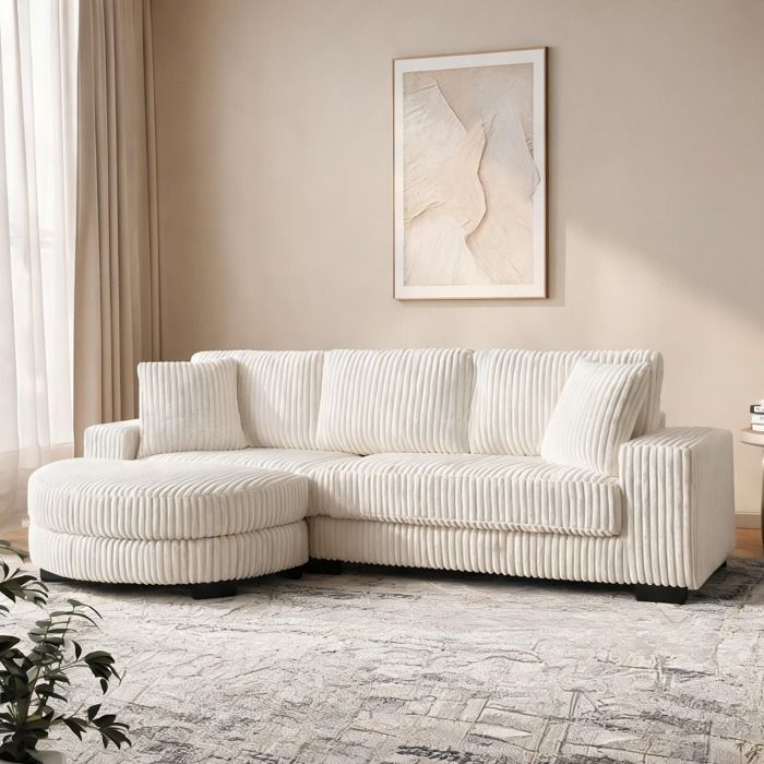 Canapé dangle 4 places en tissu côtelé beige avec pouf ovale modulable 2565 cm