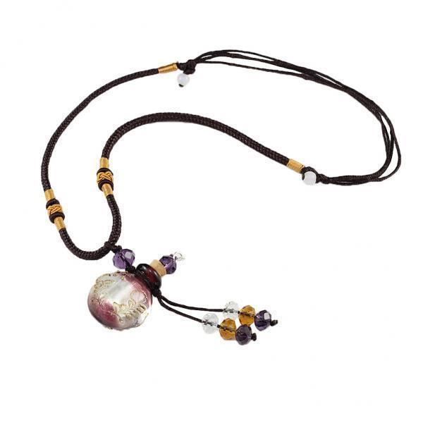 Collier Médaillon Flacon de Parfum Chanel en Métal Doré Métallisé ref