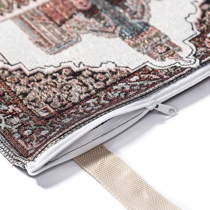 Un grand tapis de prière portable peut être plié pour être un sac à  bandoulière avec une poche latérale -  France