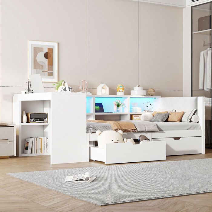 Lit plateforme en bois 90x200 avec rangements tiroirs station de recharge et tête de lit rembourrée avec lumières LED colorées