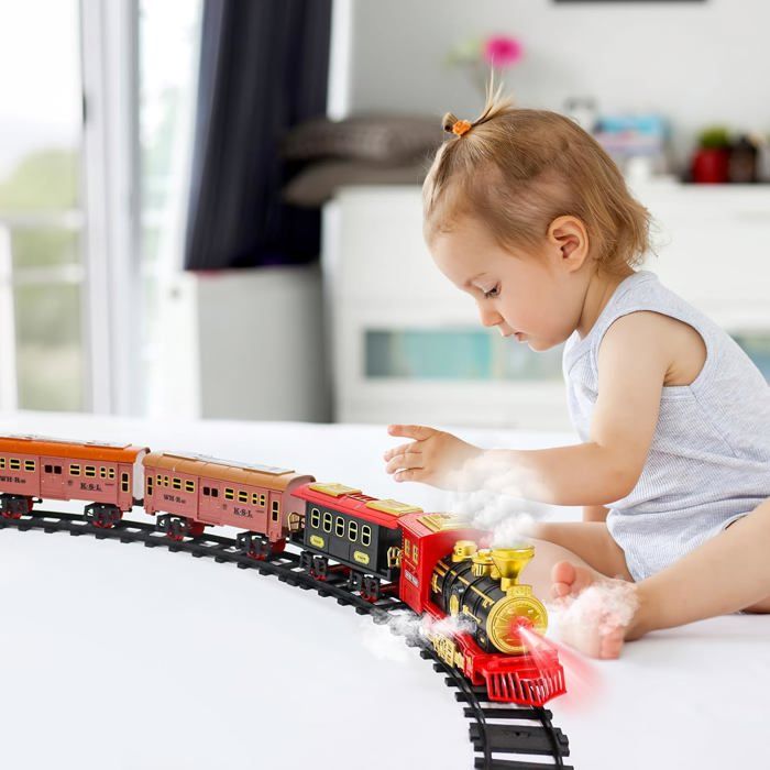 Train électrique de Noël avec sons, lumières et vapeur, complet avec