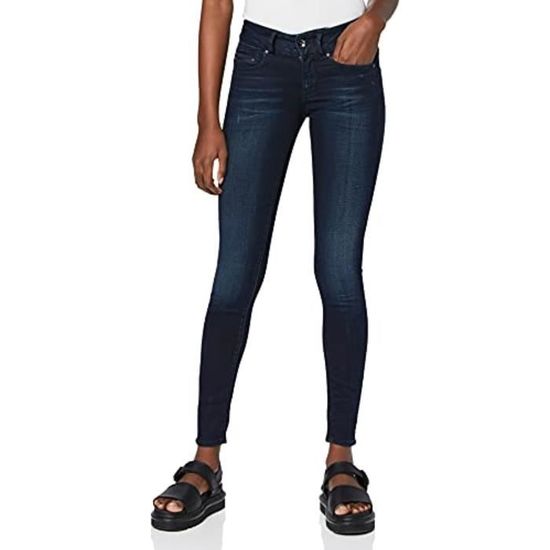 Jean 5 poches bleu indigo uni avec une coupe skinny et des surpiqûres