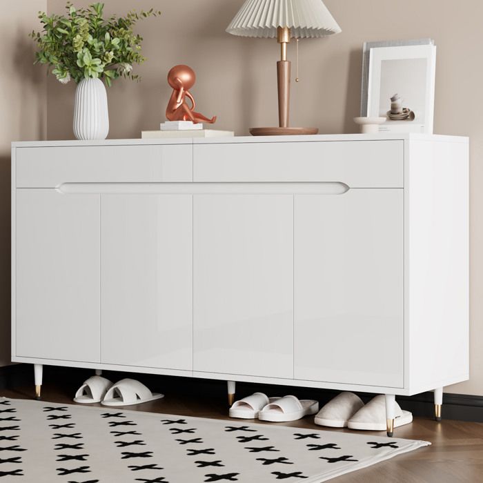 Meuble à chaussures blanc et doré 2 portes 2 tiroirs avec étagères réglables soft-close 140 x 39 x 84 cm ORVRYN