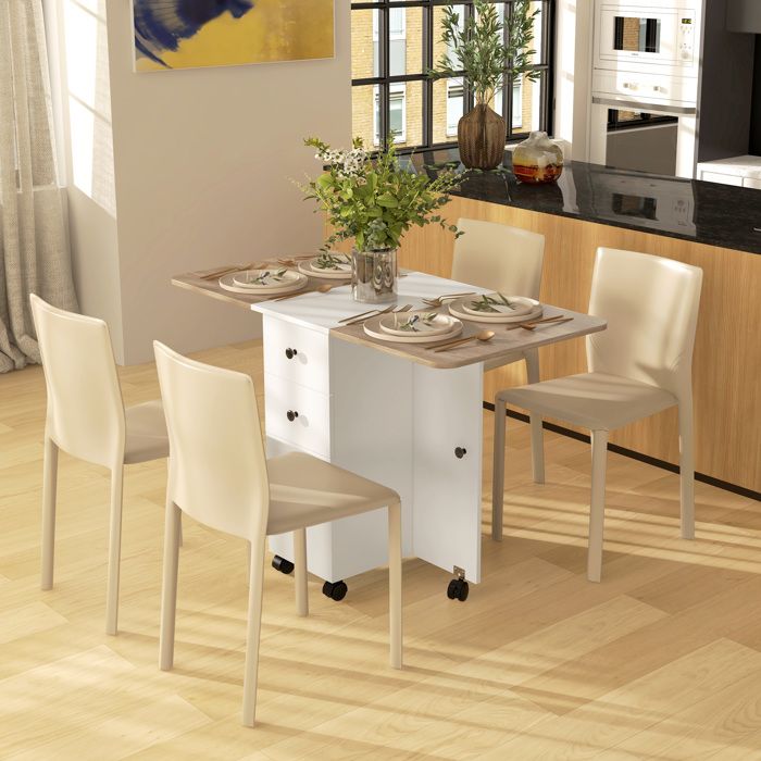 TABLE REPAS - MINIMAL - 120x60x76.5 cm - Extensible et pliable - 2 tiroirs placard et étagère - Sur roulettes 6 places TABLE REPAS - MINIMAL - 120x60x76.5 cm - Extensible et pliable - 2 tiroirs placard et étagère - Sur roulettes 6 places