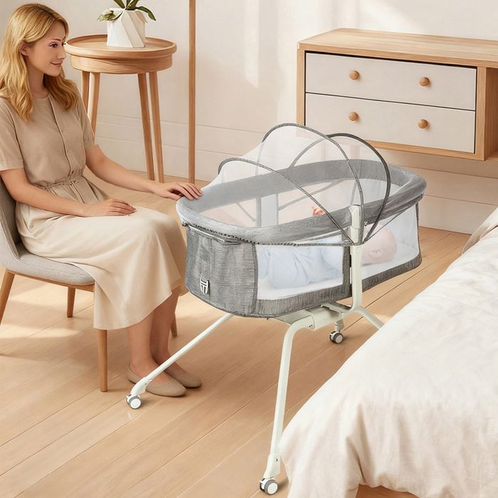 Lit bébé berceau avec roulettes pour faciliter le déplacement 94 × 70 × 80 cm gris.