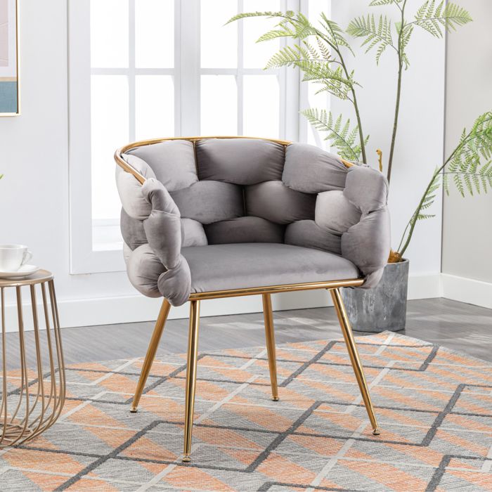 Fauteuil d’appoint moderne en velours gris avec accoudoirs structure et pieds en métal doré