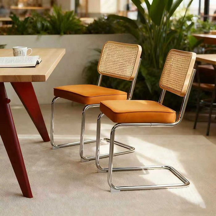 Lot de 2 chaises de salle à manger avec assise velours et dossier rotin - structure acier chromé cantilever - empilables - orange