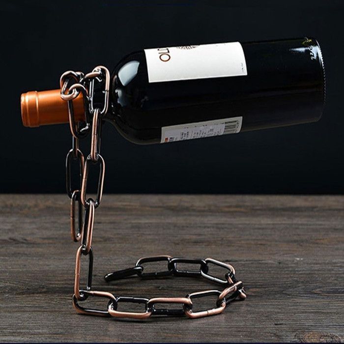 Porte-bouteille à vin vintage en cuivre signé Goardere - Arts de la table