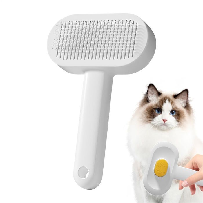 Brosse slicker auto-nettoyante chien chat jaune bouton retrait poils picots acier ronds demelage boucle suspendue