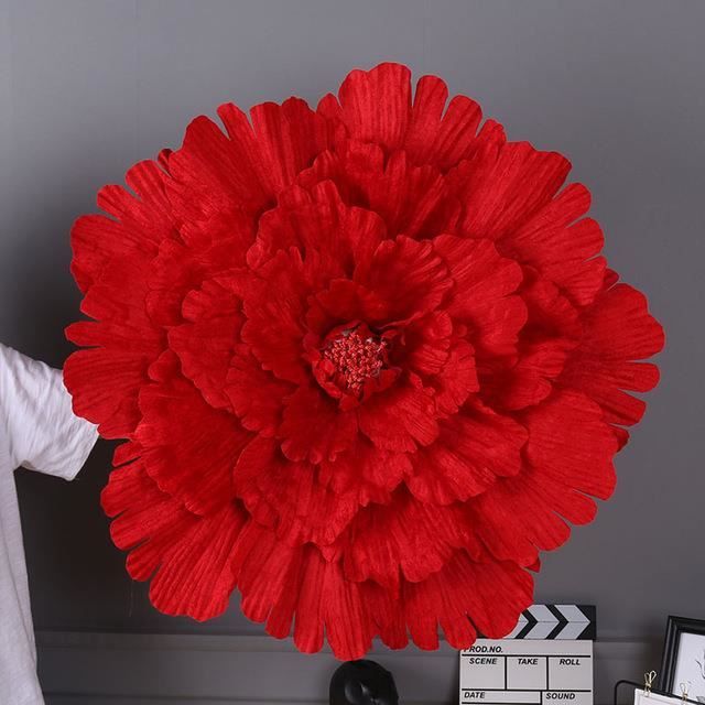 Création florale séchée rouge main image 0