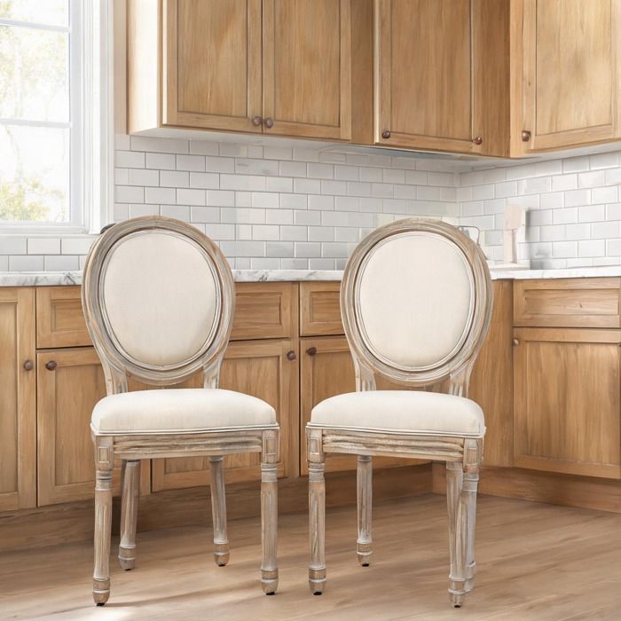 Lot de 2 chaises médaillon style Louis XVI en bois sculpté patiné aspect lin beige