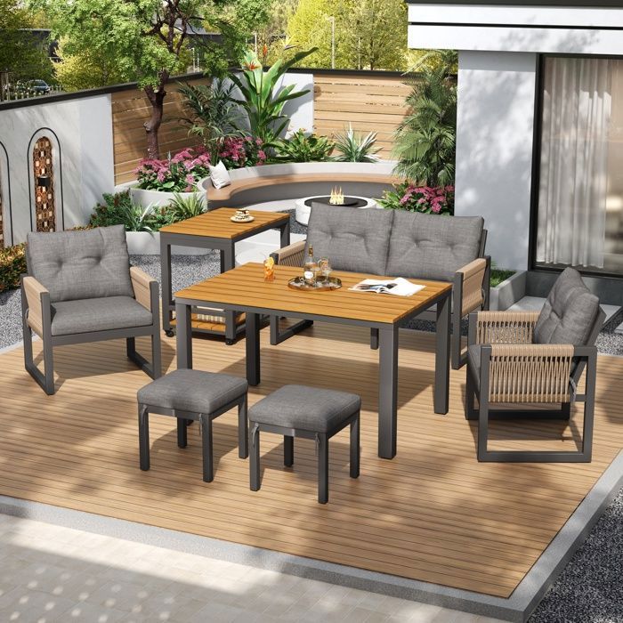 Ensemble de salon de jardin avec canapé fauteuils et table basse 6 places design modulaire résistant aux intempéries gris.
