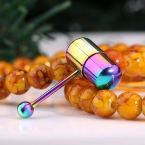 Piercing langue vibrant embouts silicone bleu et rose à picots
