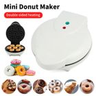 QINGQUE Mini Machine à Beignets antiadhésive chauffage double face 7 donuts à la fois 24.5cmx22cmx8cm