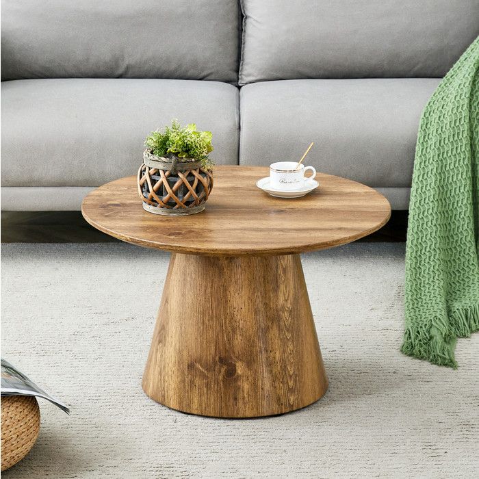 Table basse ronde aspect bois naturel en MDF compacte et polyvalente