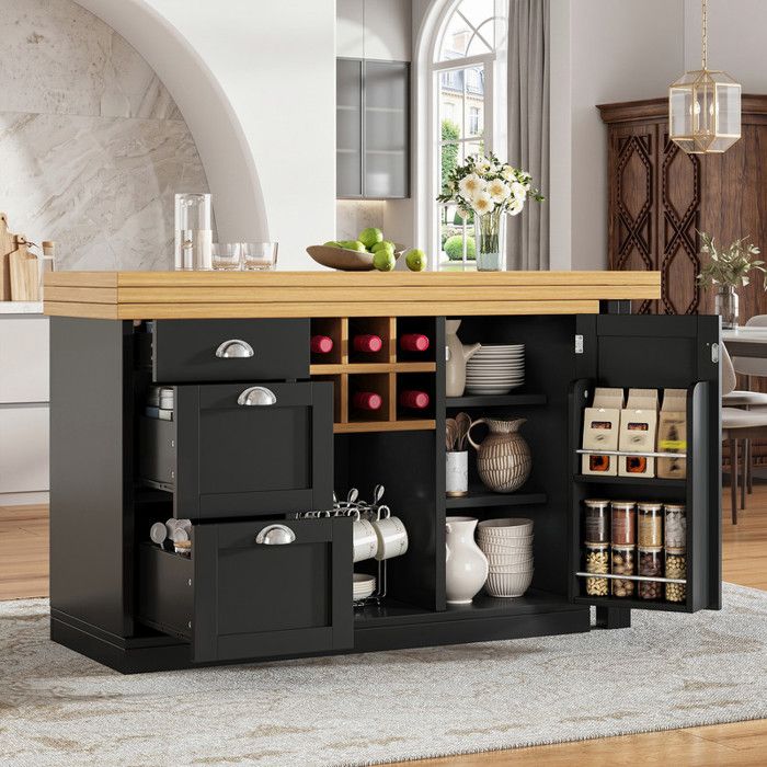 Îlot de cuisine extensible avec rangements casier à bouteilles et tiroirs poignées métalliques adapté appartements noir