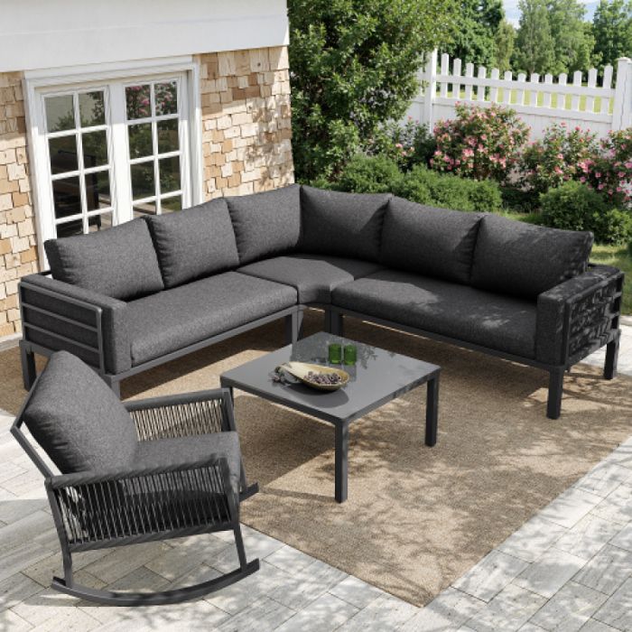 Salon bas de jardin extérieur modulable avec canapé d’angle fauteuil à bascule et table en verre