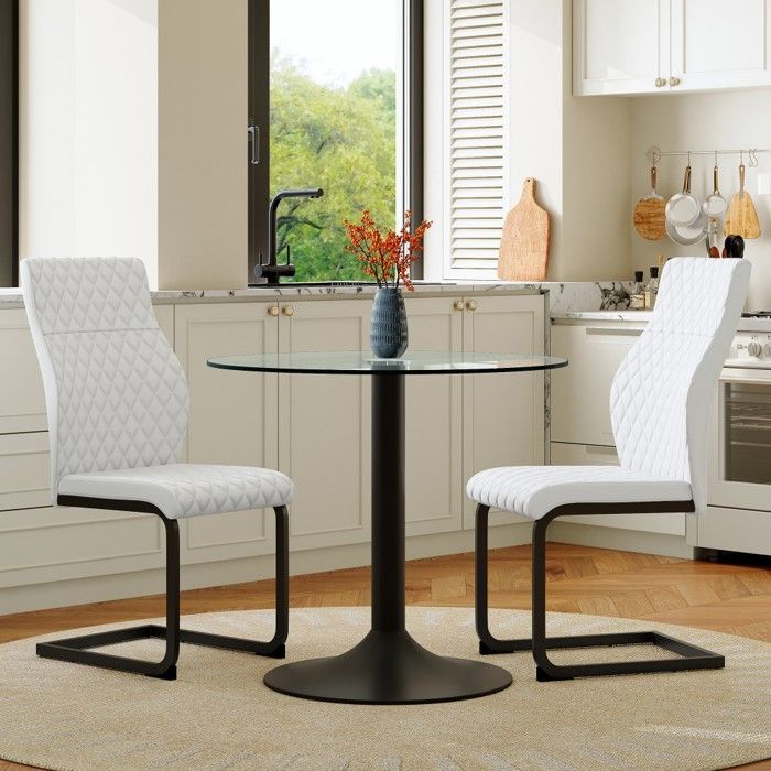 Table ronde verre ensemble 2 chaises haut dossier PU blanc capiton losange pieds noirs petit espace repas 85x85x76cm 43x63x100cm