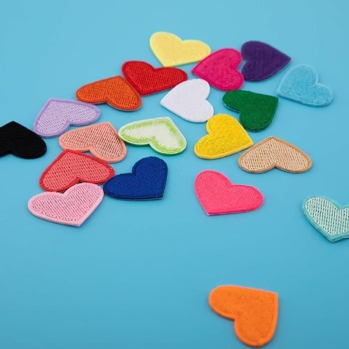 Une boîte de puzzle avec des pièces multicolores - Le Curionaute
