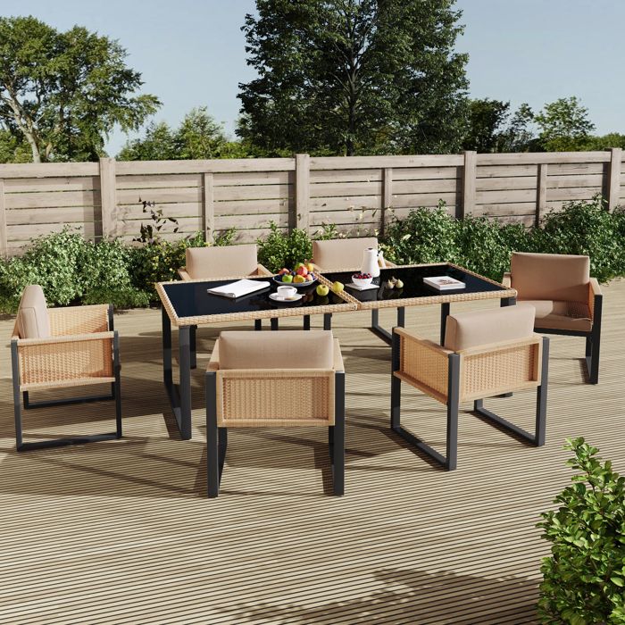 Ensemble table et chaises de jardin six places avec fauteuils housses en tissu amovibles et lavables rotin marron.