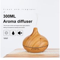 QVBOKAY Diffuseur Huiles Essentielles 300ml Humidificateur d'air Ultrasonique Brume Fraîche Arôme Parfum Electrique avec 7-Couleurs.