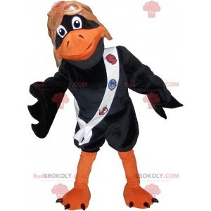 DÉGUISEMENT - PANOPLIE Mascotte de corbeau noir et orange avec un casque 