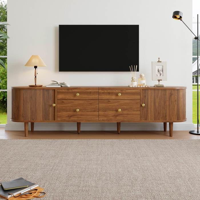 Meuble TV bas 180x35x50 cm 2 portes coulissantes à façade ondulée 3D 4 tiroirs angles arrondis 5 pieds bois MDF/PB Effet Noyer