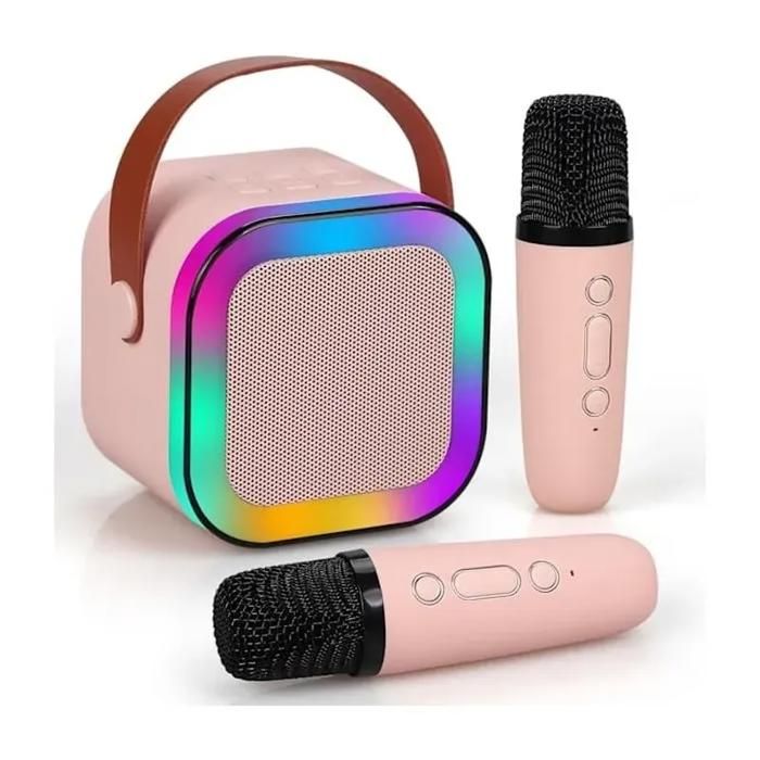 Mini karaoké portable avec enceinte Bluetooth et 2 microphones sans fil cadeau idéal pour les fêtes danniversaire. Mini karaoké portable avec enceinte Bluetooth et 2 microphones sans fil cadeau idéal pour les fêtes danniversaire.