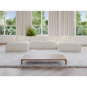 CANAPÉ FIXE Grand canapé d'angle panoramique en tissu bouclette blanc POGNI de Maison Céphy