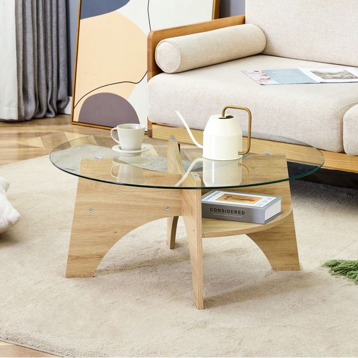 Table basse ronde en verre transparent avec piètement éventail décor bois