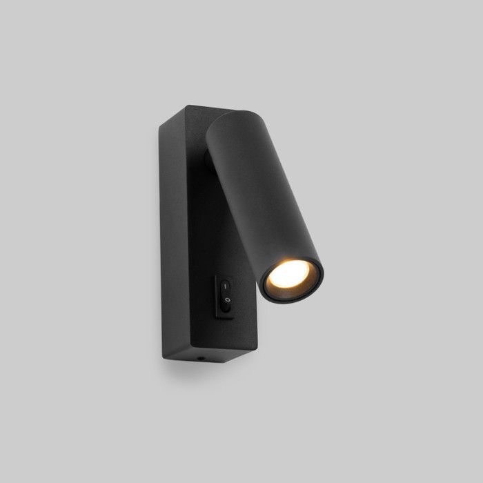 Applique LED 2W 3000K orientable en aluminium noir avec interrupteur à bouton PISAle montage sur têtes de lit ou surfaces.