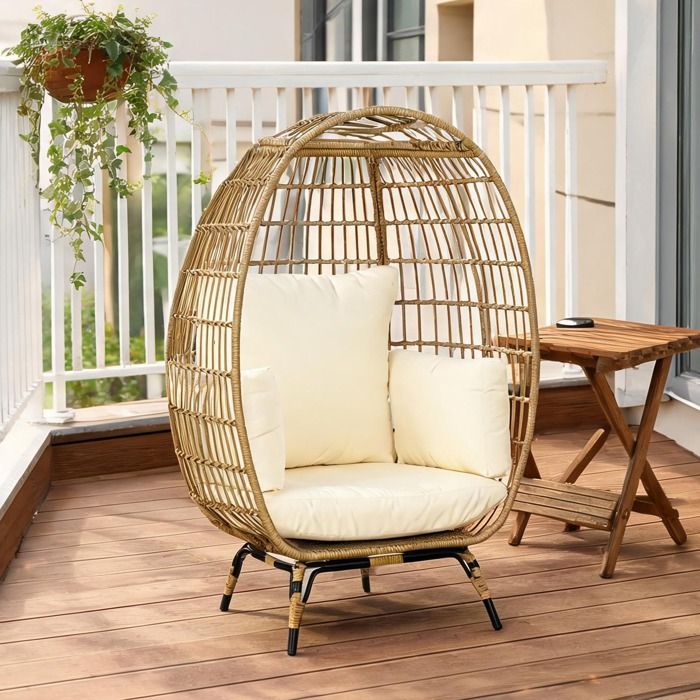 Fauteuil de jardin ovale en rotin synthétique beige-toned structure acier coussins épais pour terrasse