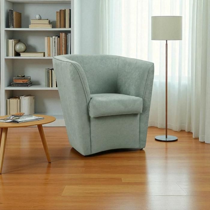 Fauteuil vert menthe en tissu anti-taches au design moderne Fauteuil vert menthe en tissu anti-taches au design moderne