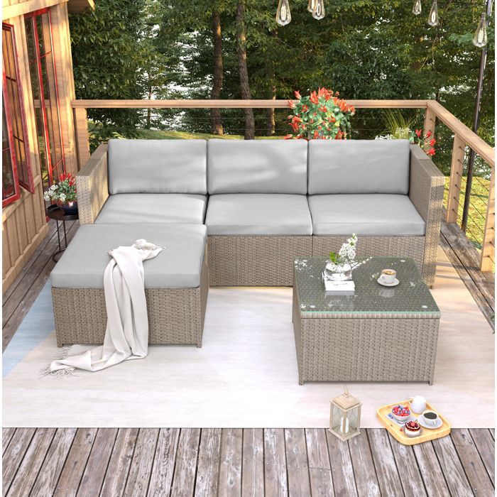 Salon de jardin en polyrotin avec canapé lounge pouf et table basse verre – Brun ou noir