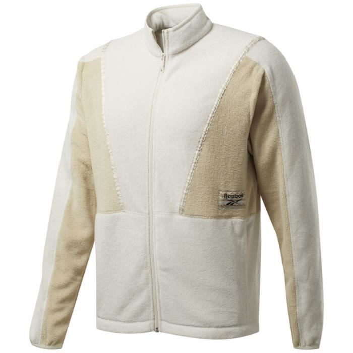 Veste de survêtement Reebok CLASSICS WINTER ESCAPE - Réf. FT7183. Couleur : Blanc, Beige. Détails. - Coupe standard. - Col montant.