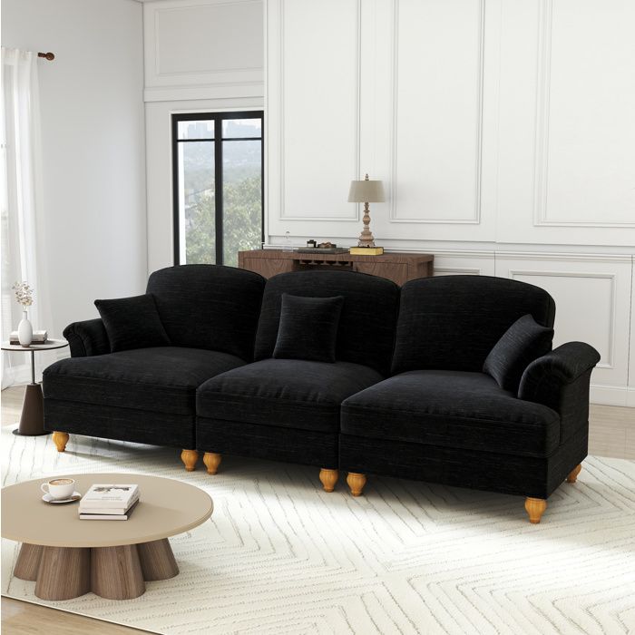 Canapé fixe 3 places en chenille noire style Mid-Century avec jupe amovible accoudoirs évasés et pieds fuselés ORVRYN