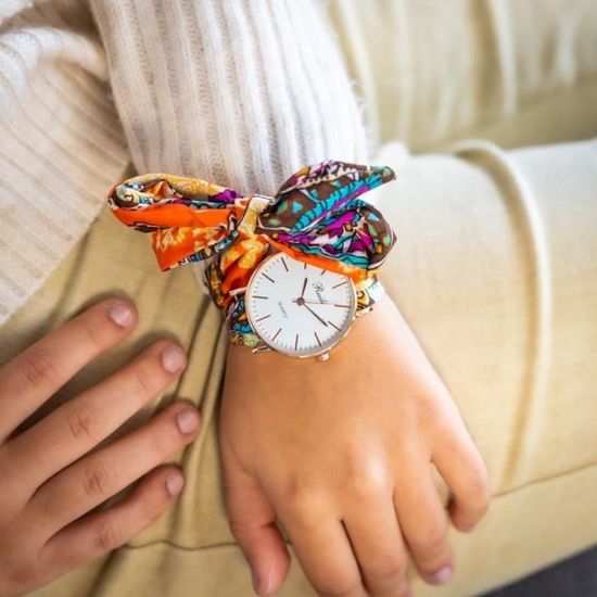 Montre bracelet tissu sale femme