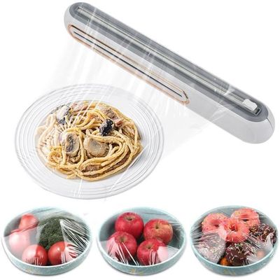 Distributeur de Film Alimentaire - Blanc - 38 cm - Magnétique - Couteau Amovible - Utilisation Sécurisée - Au quotidien Distributeur de Film Alimentaire - Blanc - 38 cm - Magnétique - Couteau Amovible - Utilisation Sécurisée - Au quotidien