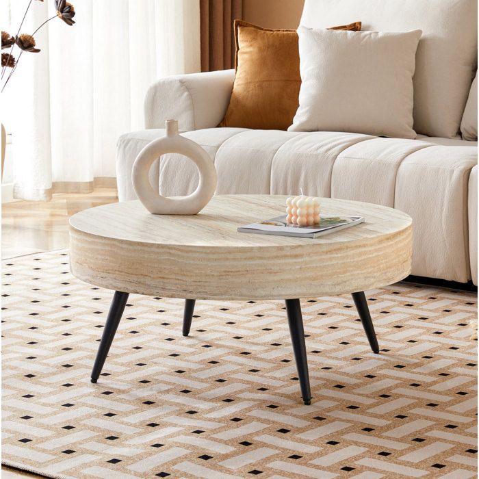 Table basse ronde effet travertin clair avec pieds en métal noir